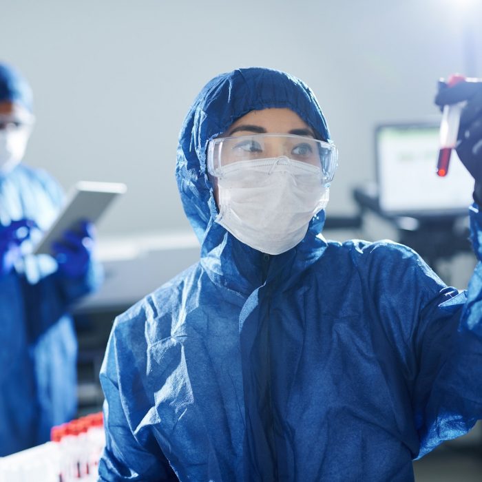 Healthcare scientist working with dangerous sample